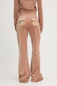 Odzież Juicy Couture spodnie dresowe welurowe HERITAGE CROWN CAISA LOW RISE PANT JCGBJ224012.681 brązowy