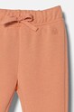 Dziewczynka United Colors of Benetton spodnie dresowe bawełniane dziecięce 3J70GF01N.G.P.Seasonal pomarańczowy