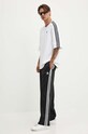 Nohavice adidas Originals Adicolor Baggy Fit Firebird Pant čierna IZ4801