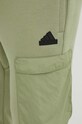 Спортивні штани adidas City Escape зелений IV7419
