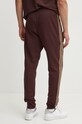Odzież adidas spodnie dresowe bawełniane Essentials IW7681 brązowy