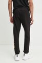 Odzież Versace Jeans Couture spodnie dresowe bawełniane 77GAAT05.CF00T czarny