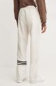Odzież adidas Originals spodnie dresowe JF9158 beżowy