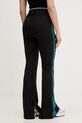 Ρούχα Puma παντελόνι επίσημο γυναικείο βαμβακερό με ελαστάν T7 Classics Play Paris Flared 626809 μαύρο