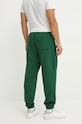 Odzież New Balance spodnie dresowe bawełniane MP41508NWG zielony