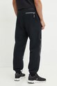 Odzież The North Face spodnie dresowe TNF x 30th Years HMLYN NF0A88XK4O41 czarny