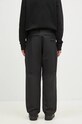 Odjeća Donji dio trenirke adidas National Geographic Pant IX7923 crna