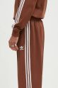 adidas Originals spodnie dresowe Baggy Track Pant brązowy IZ2476