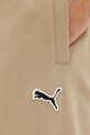 Puma spodnie dresowe bawełniane beżowy 676816