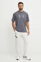 Spodnji del trenirke Under Armour Unstoppable Fleece 1389353 bež AW24
