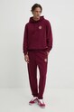 Pamučni donji dio trenirke Tommy Jeans DM0DM19805 bordo AW24