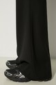 Vlnené nohavice AMBUSH Flare Pants BMCO003F24FAB0011000 čierna
