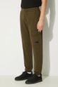 Одежда Хлопковые спортивные штаны C.P. Company Diagonal Raised Fleece Cargo Sweatpants 17CMSP017A005086W зелёный