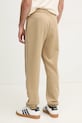 Odzież Fila spodnie dresowe Lincoln FAM0663 beżowy