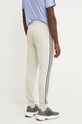 Îmbrăcăminte adidas pantaloni de trening din bumbac Essentials IW7682 bej