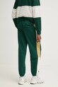 Abbigliamento Converse pantaloni della tuta 10027594.A01 verde