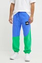 Tepláky The North Face TNF x Yinka Ilori modrá NF0A89GG0IG1