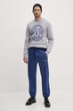 Вовняний светр Versace Jeans Couture 77GAFM02.CMH42 блакитний AW24