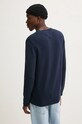 Oblečení Bavlněný svetr Tommy Jeans DM0DM19429 námořnická modř