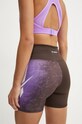 Одяг Шорти для тренувань Reebok LUX Collection 100205570 коричневий
