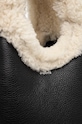Usnjena torbica Coperni Shearling Mini Bucket Swipe Bag črna COPBA69840S