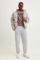 Бавовняна футболка Karl Kani 60300094 коричневий AW24