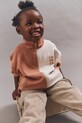 Liewood bluza bawełniana dziecięca Cassius Zip-up Sweatshirt wzorzyste pomarańczowy LW20080.9BYA