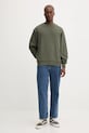 Βαμβακερή μπλούζα Tommy Jeans DM0DM21622 πράσινο AW25