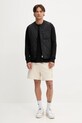 Bavlněné tričko s dlouhým rukávem Tommy Jeans DM0DM21594 černá AW25
