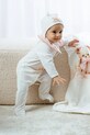 Kojenecká čepice Jamiks SOELI SOELI.Nak.glow.JZI150.G béžová