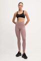New Balance legginsy treningowe WP51126EAS brązowy AW25