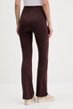 Odzież adidas legginsy Essentials JY3328 brązowy
