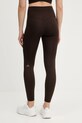Odzież adidas Performance legginsy treningowe KT3284 brązowy