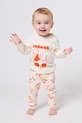 Bobo Choses legginsy niemowlęce Rolling Dog beżowy 225FB010