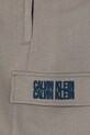 Chłopiec Calvin Klein Jeans spodnie dresowe bawełniane dziecięce TERRY IB0IB02522.9BYA szary