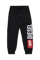 Dětské bavlněné tepláky Diesel PANTLI TROUSERS pletenina černá J02445