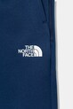 CHLAPEC Dětské tepláky The North Face B MOUNTAIN ATHLETICS JOGGERS NF0A89HW8Z41 námořnická modř