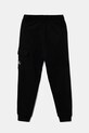 Дитячі бавовняні штани Calvin Klein Jeans IB0IB02199.9BYA чорний AW25
