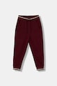 Дитячі спортивні штани United Colors of Benetton трикотаж бордо 32N4CF06E.G.seasonal