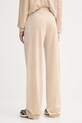 Odzież Guess spodnie dresowe COUTURE V3BB26.K0232 beżowy