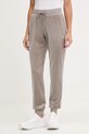 Guess spodnie dresowe welurowe COUTURE z elastanem beżowy V3BB27.K0232
