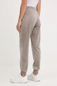 Guess spodnie dresowe welurowe COUTURE V3BB27.K0232 beżowy AW25