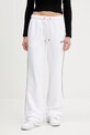 Хлопковые спортивные штаны Guess Jeans аппликация белый W5YB32.K68I4