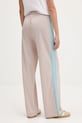 Odzież adidas Originals spodnie dresowe Firebird JY2691 beżowy