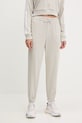 adidas spodnie dresowe Essentials beżowy JC8305