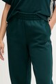 adidas spodnie dresowe Essentials zielony JX0443