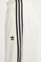 adidas Originals spodnie dresowe Satin Tp Wl beżowy KD2542