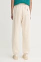 Odzież American Vintage spodnie dresowe FIK05A beżowy