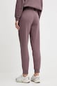 Одежда Спортивные штаны Puma 682467 фиолетовой