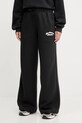 New Balance pantaloni de trening tricotaj negru WP53902BK